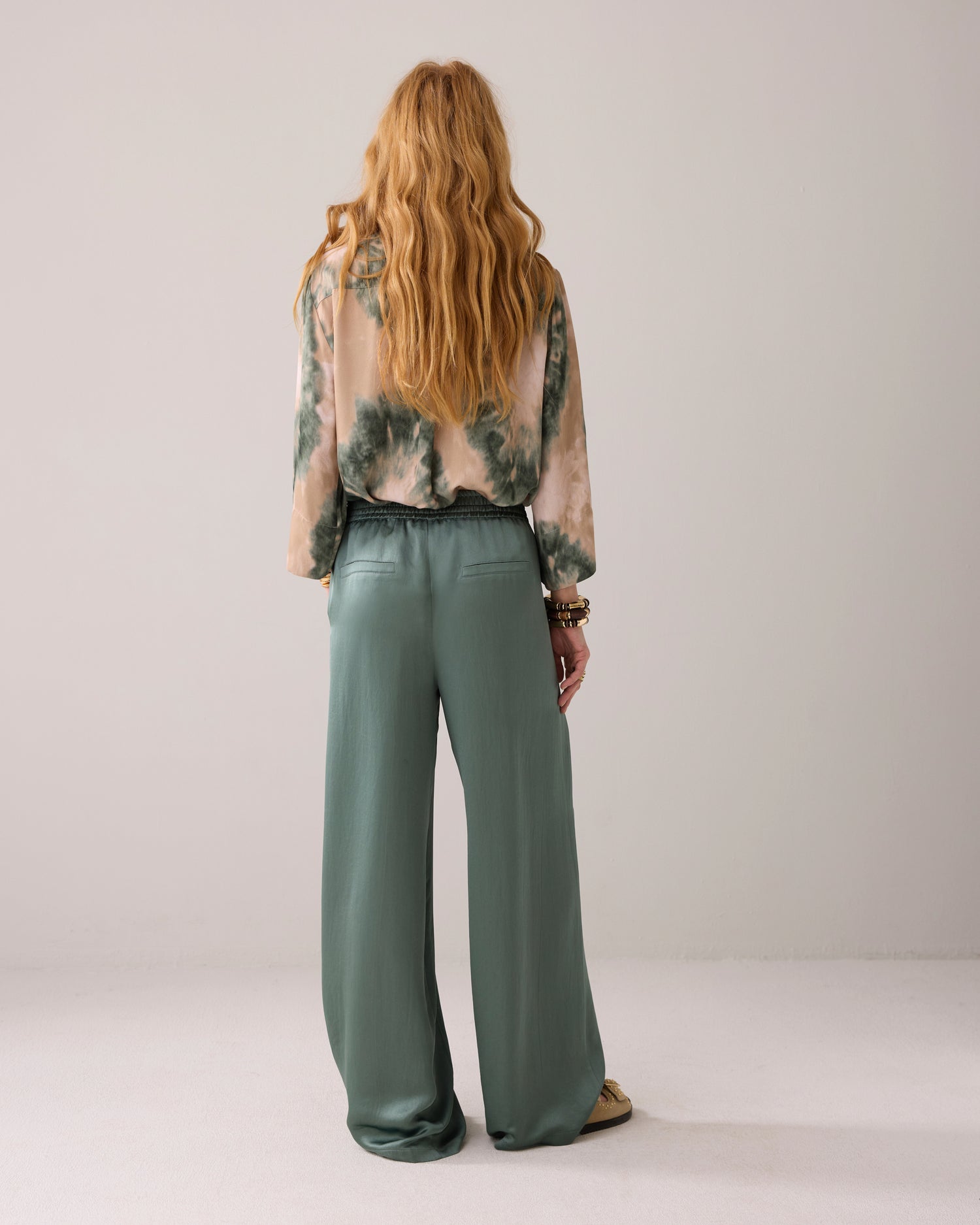 Glanzende lange broek