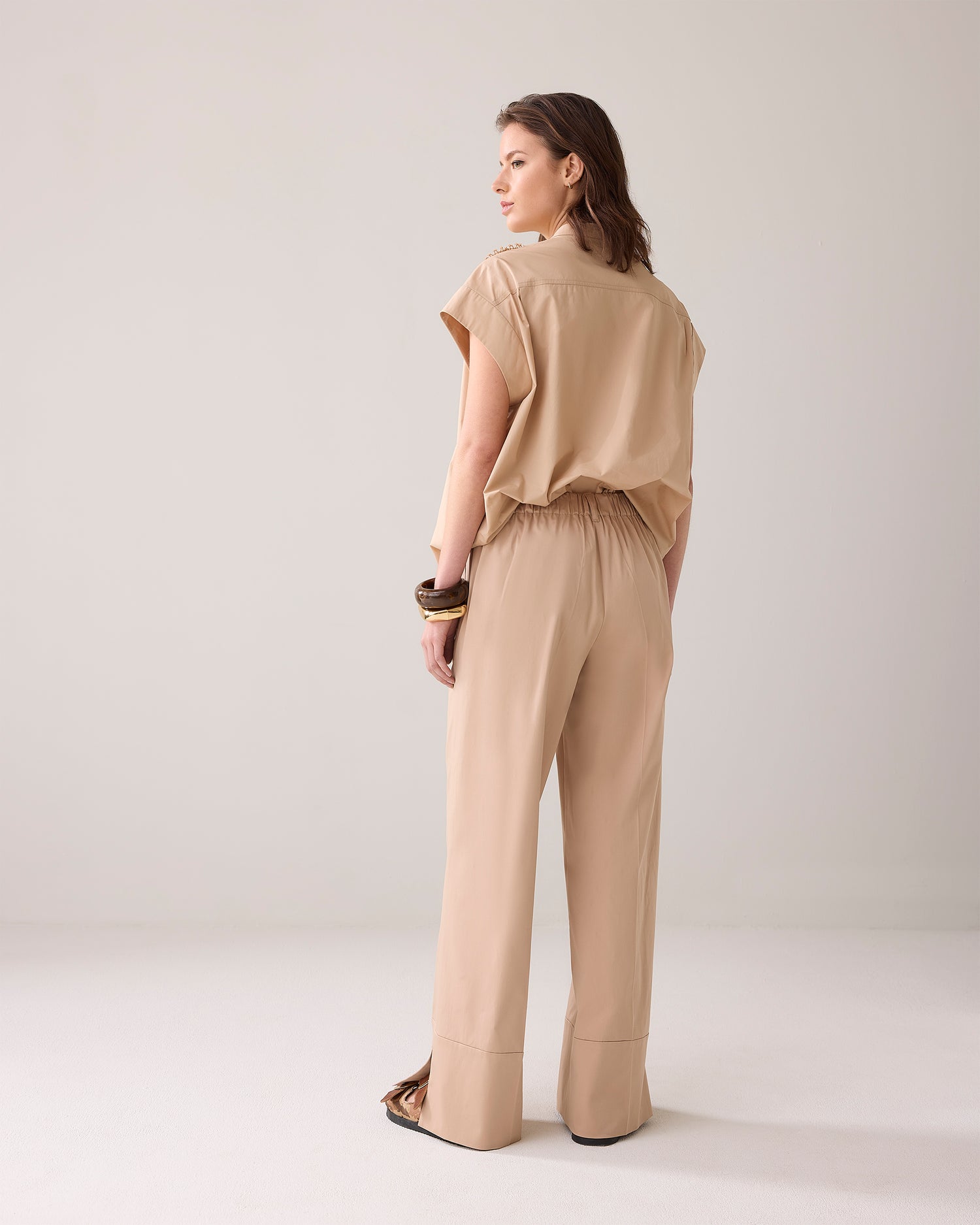 Long trousers with slit
