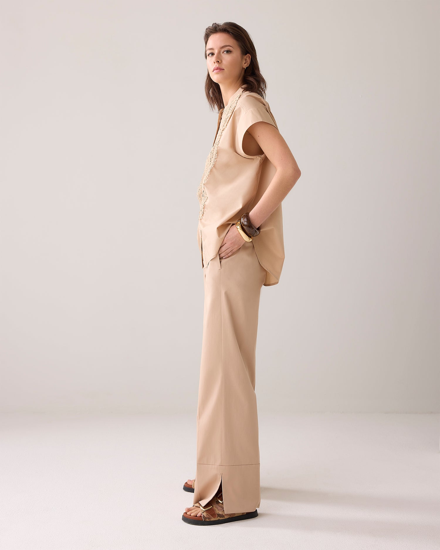 Long trousers with slit