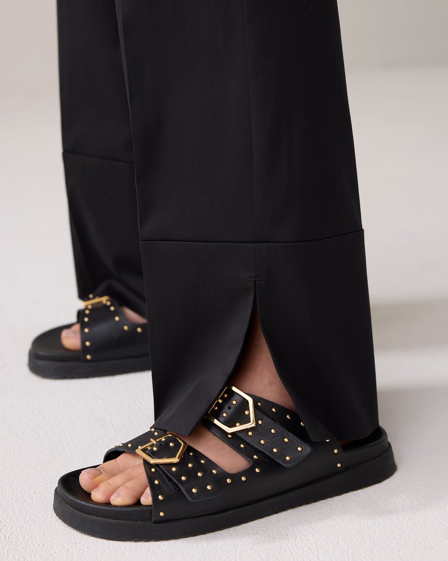 Long trousers with slit