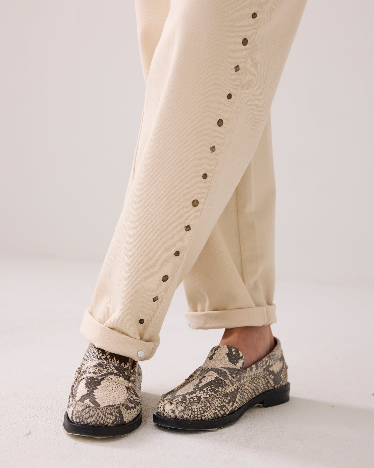 White jeans with studs