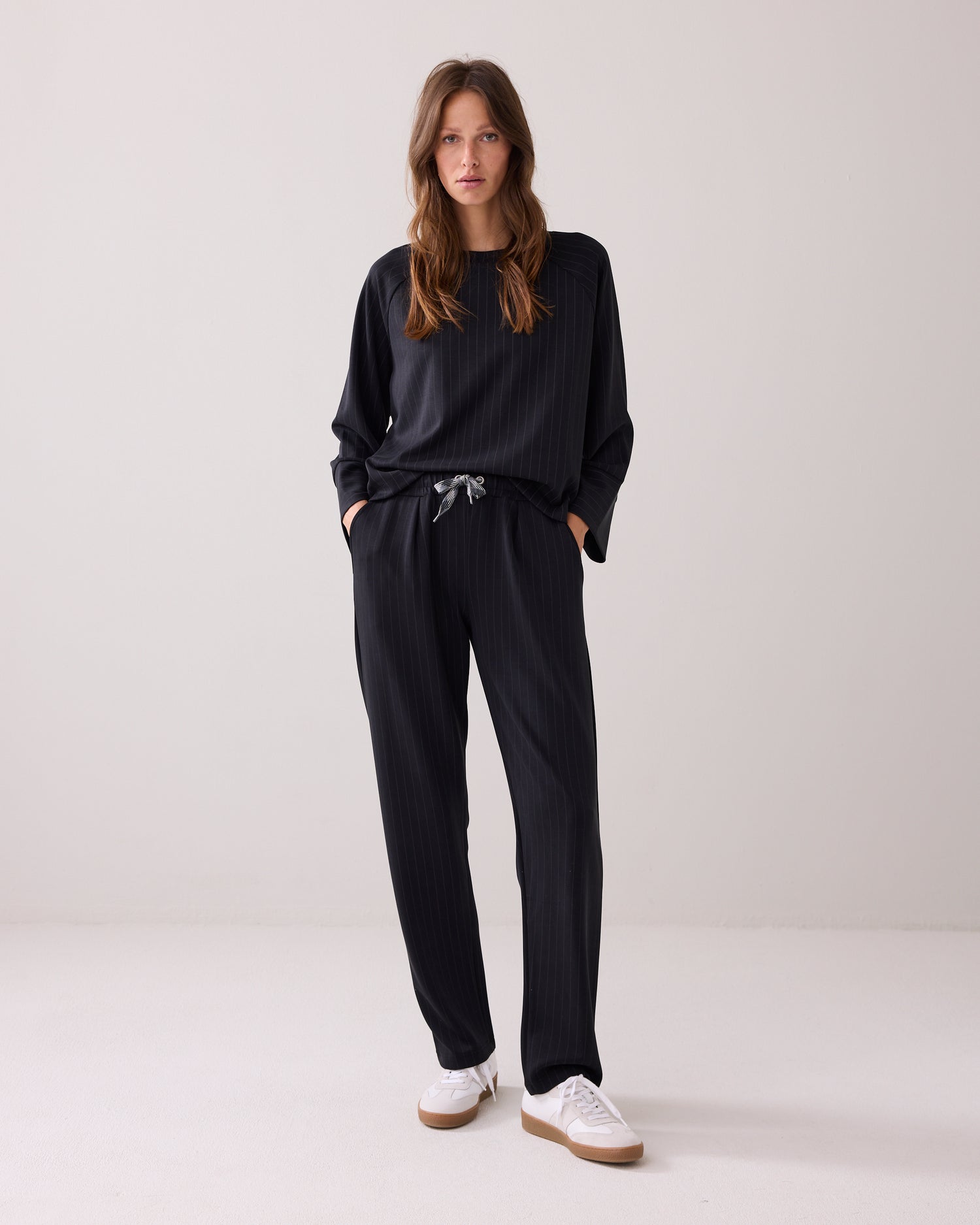 Sporty trousers with pinstripe