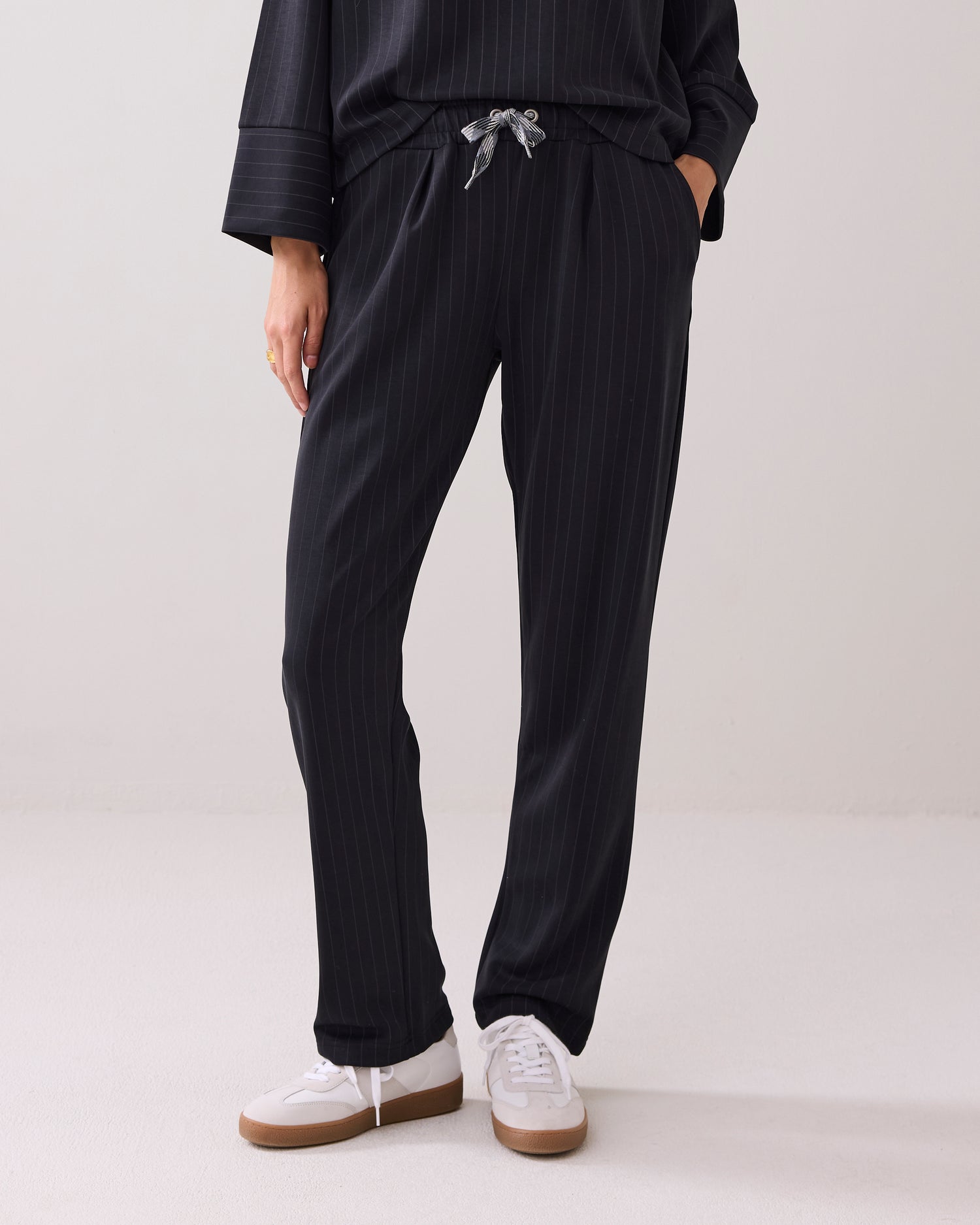 Sporty trousers with pinstripe