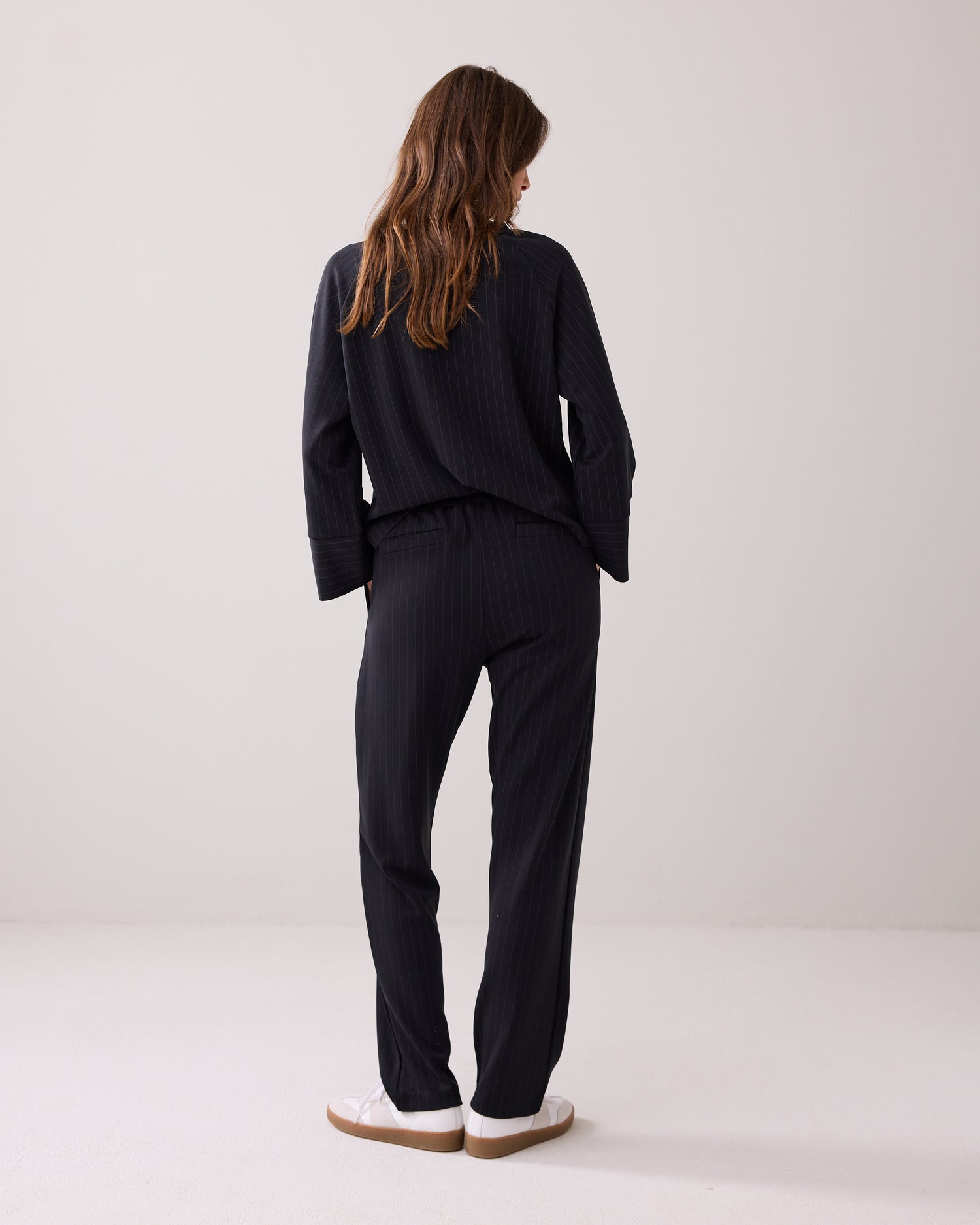 Sporty trousers with pinstripe