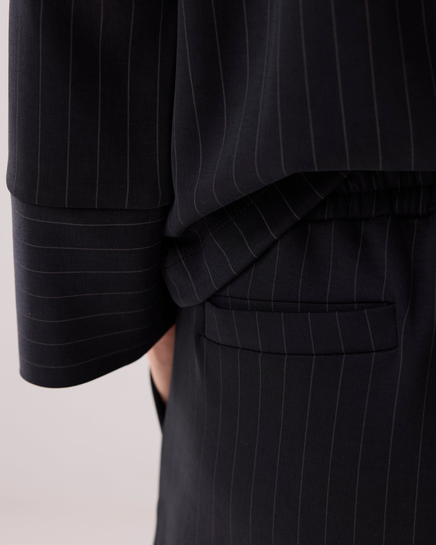 Sporty trousers with pinstripe