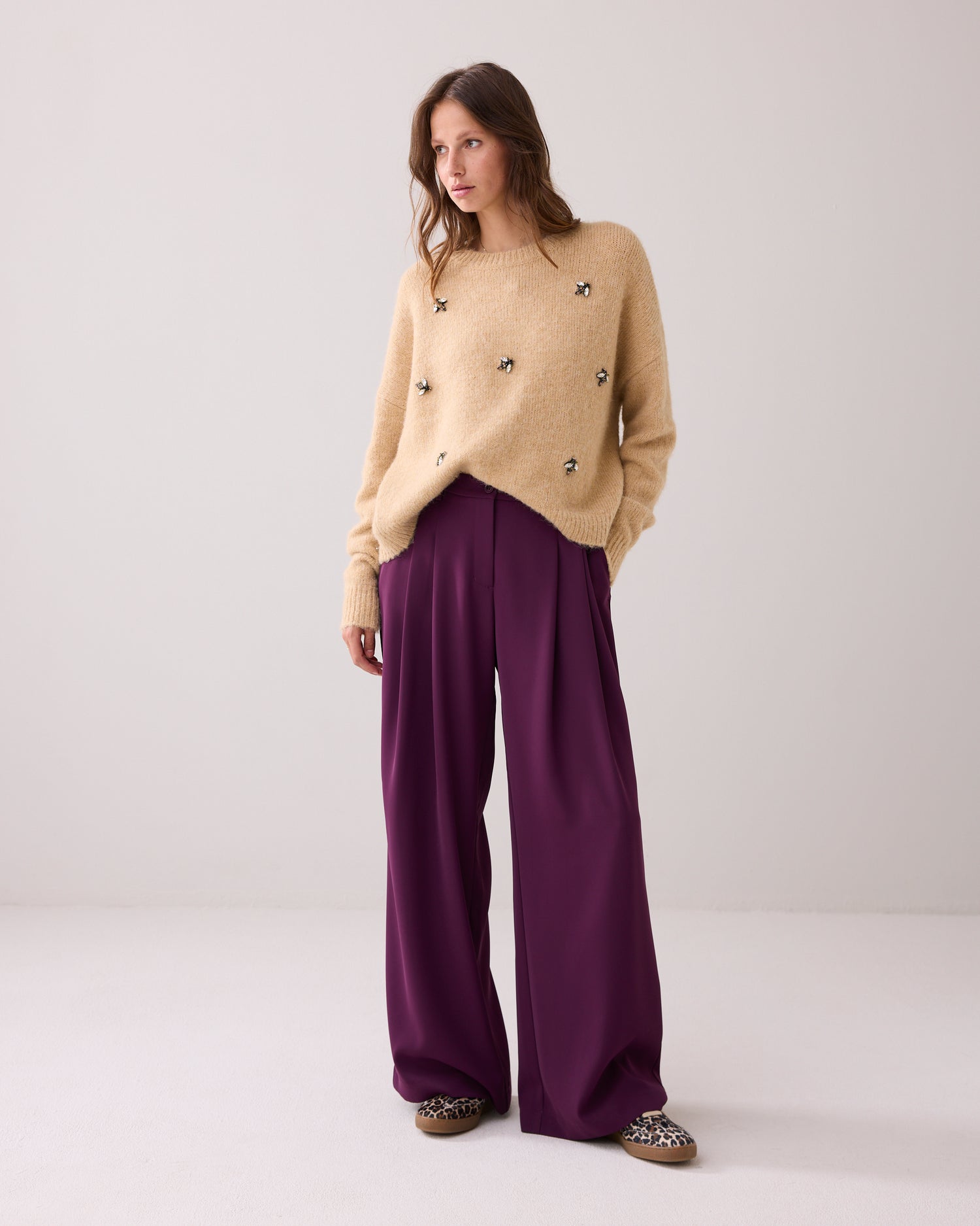 Flared trousers with press crease