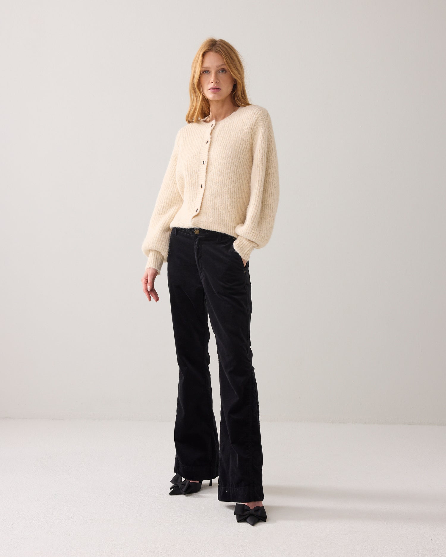 Flared trousers in a velvet finish