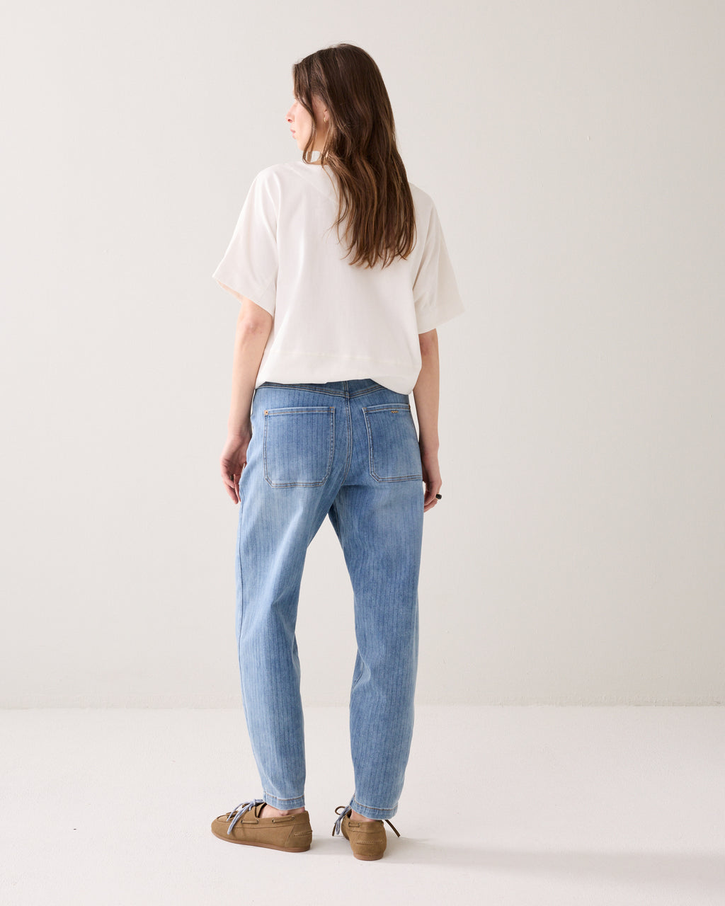 Jeans avec une bande imprimée au laser