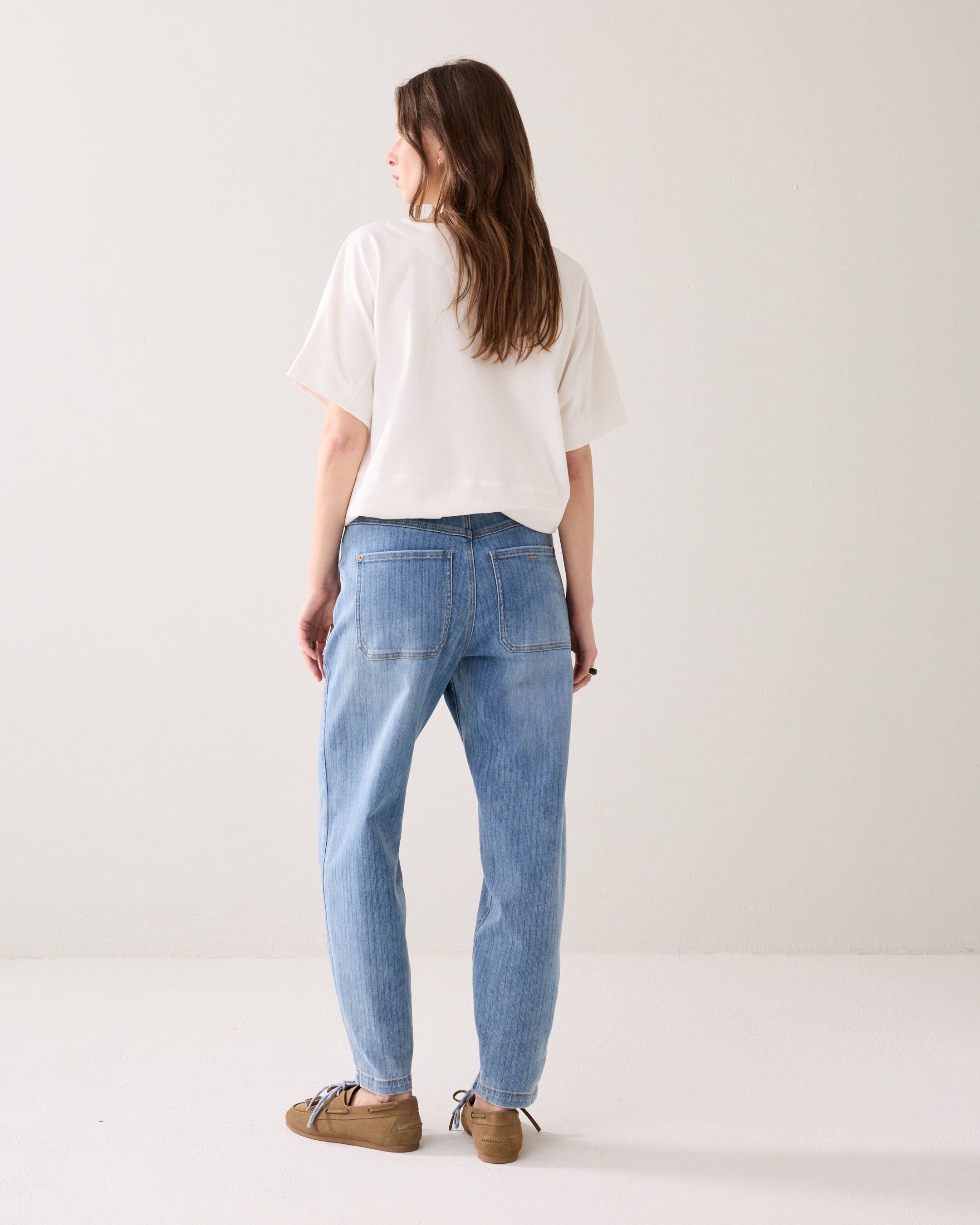 Jeans avec une bande imprimée au laser