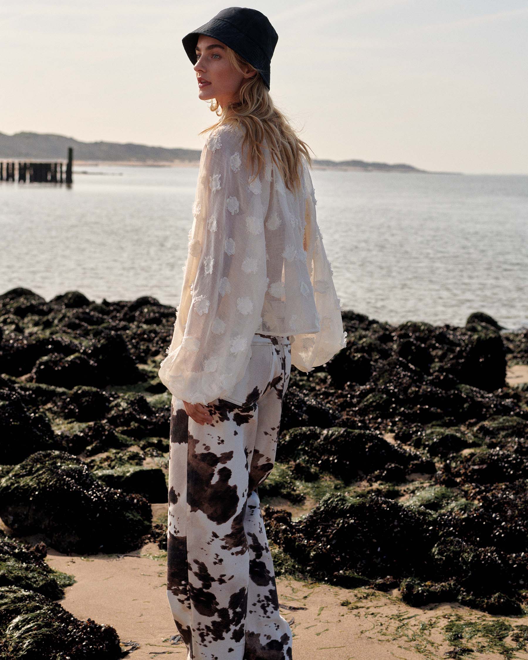 Baggy straight-leg trousers in cow print – Summum
