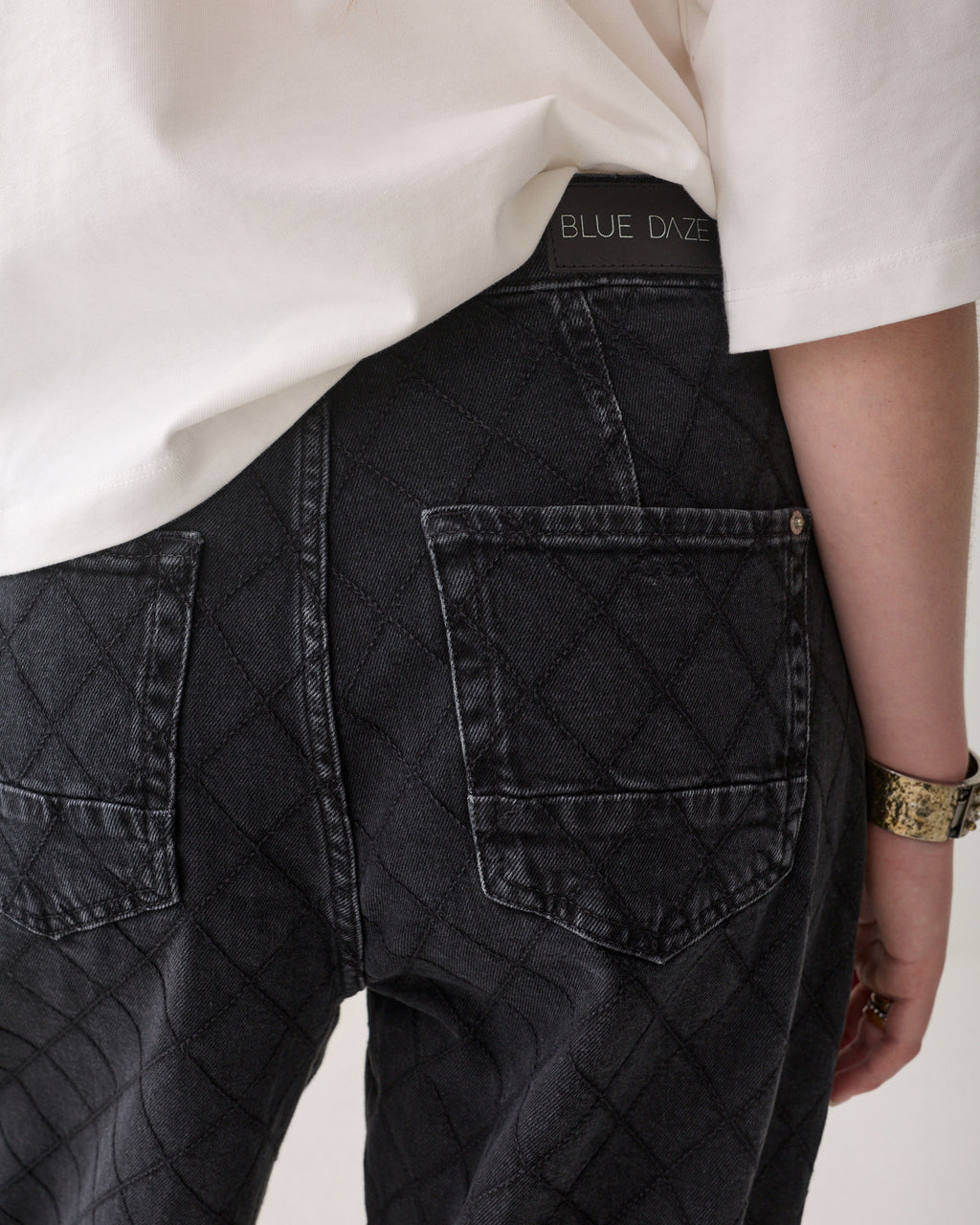 Tapered jeans ruitjessteek