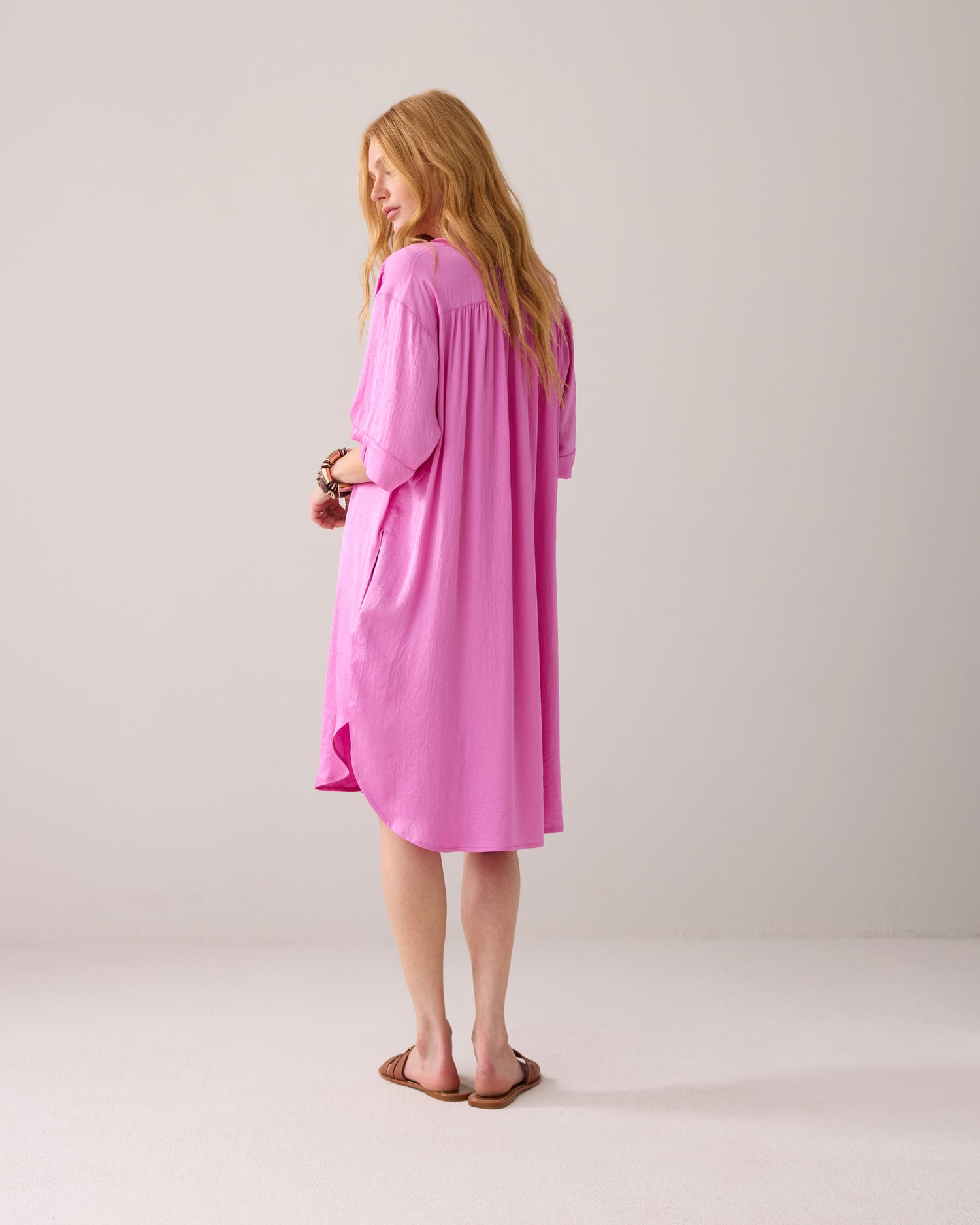 Tunic dress with button fastening