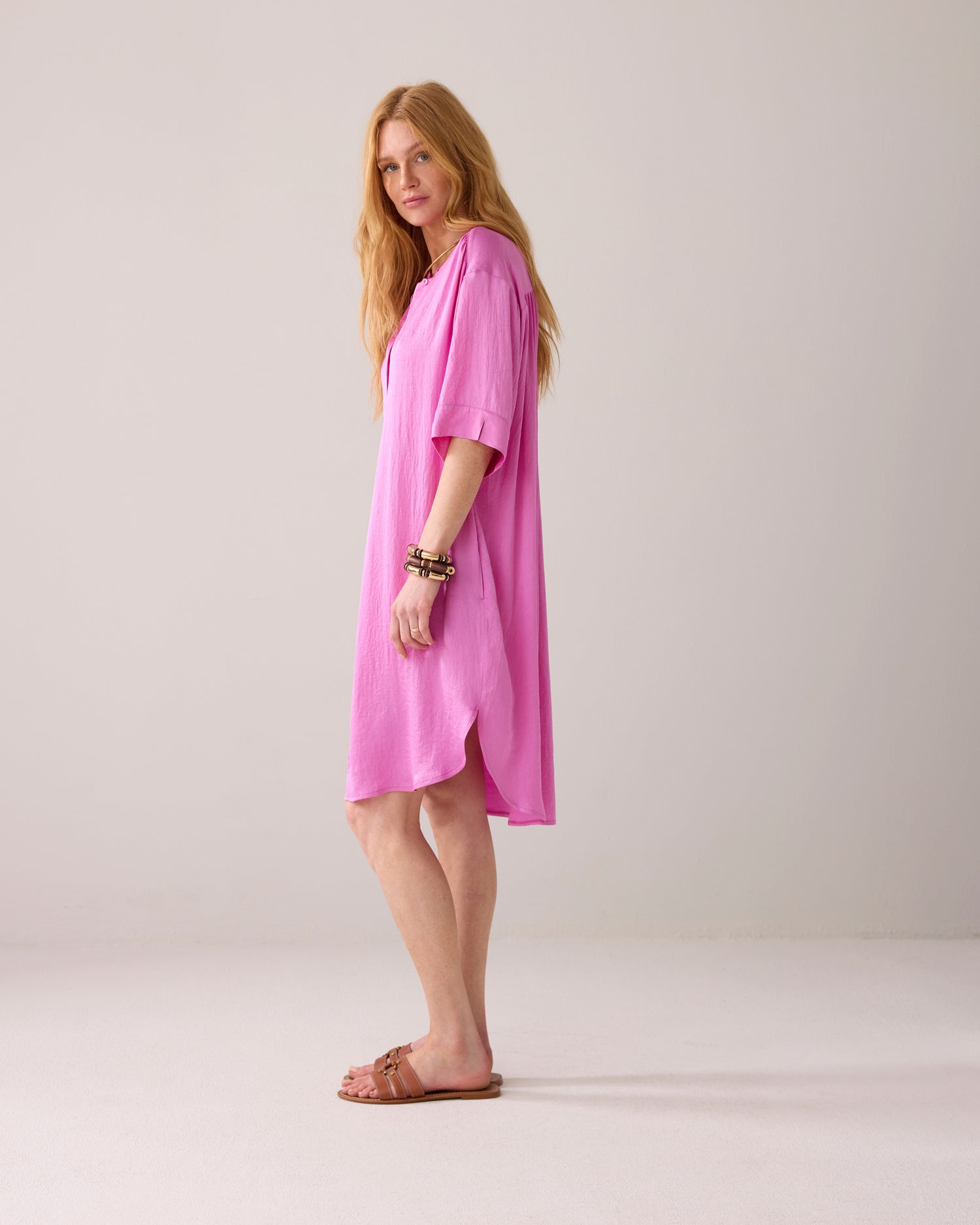 Tunic dress with button fastening