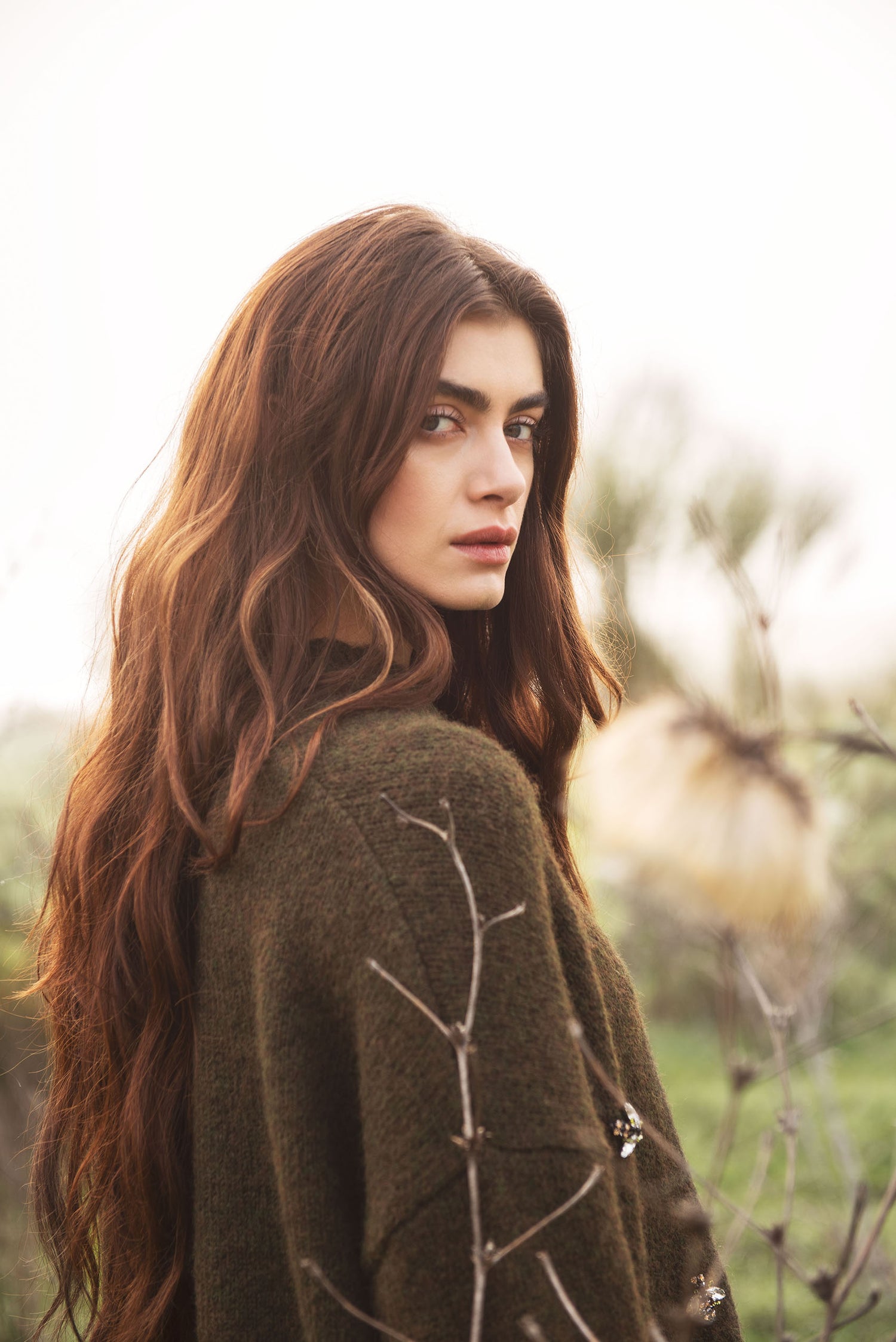 Jumper with brooches