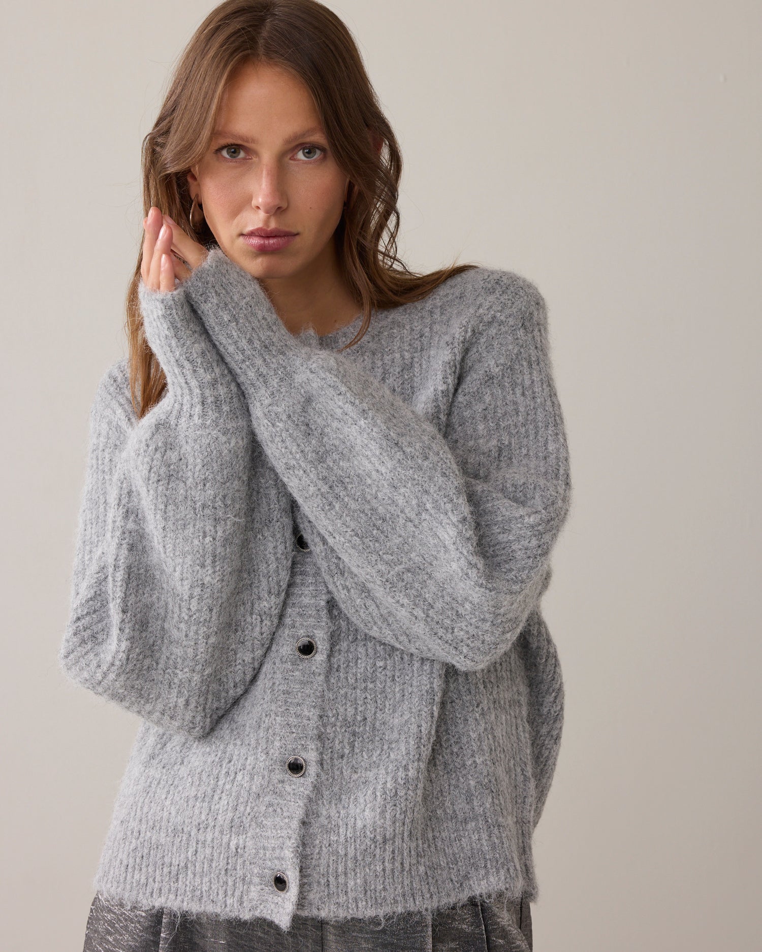 Knitted cardigan with large puff sleeves