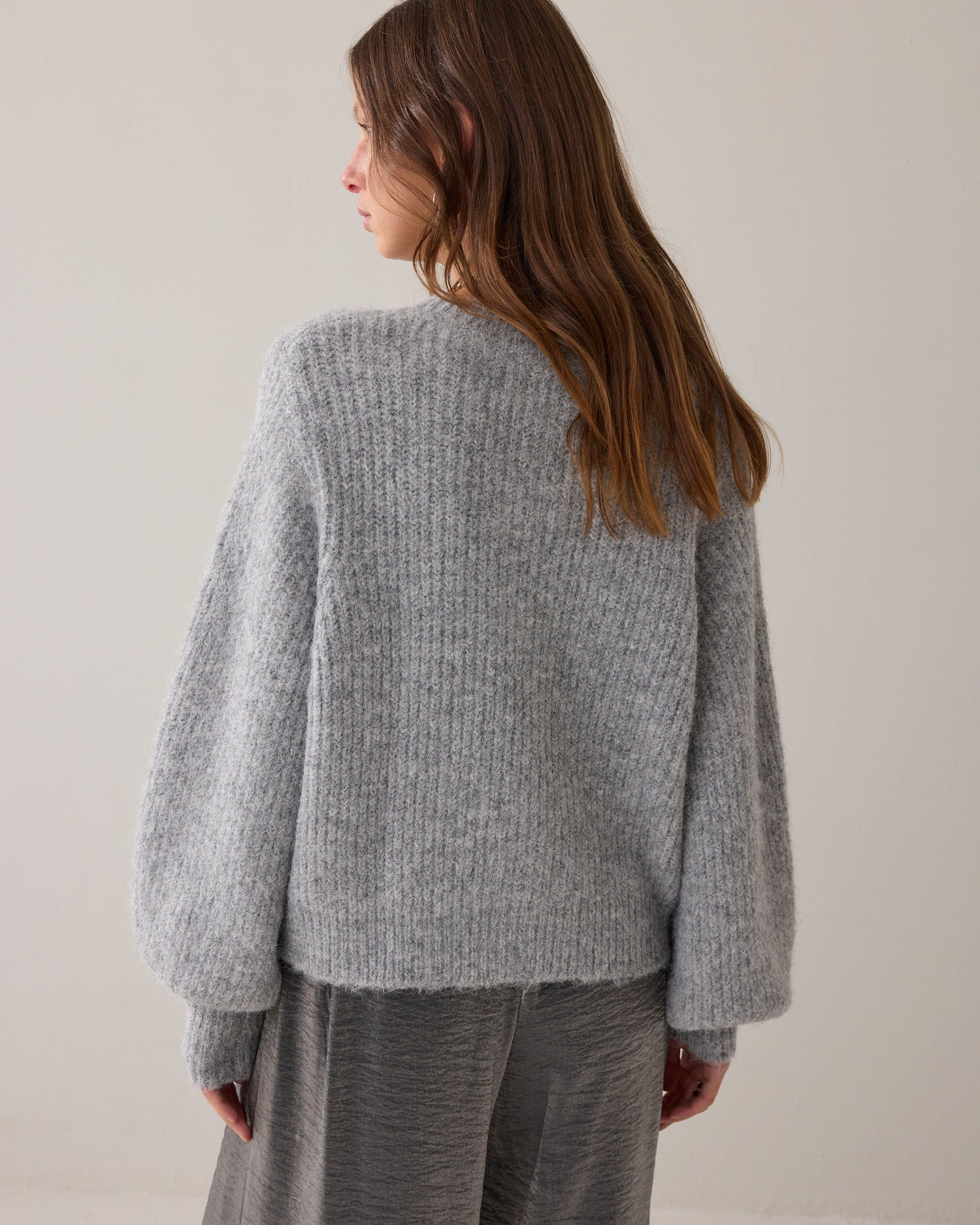 Knitted cardigan with large puff sleeves