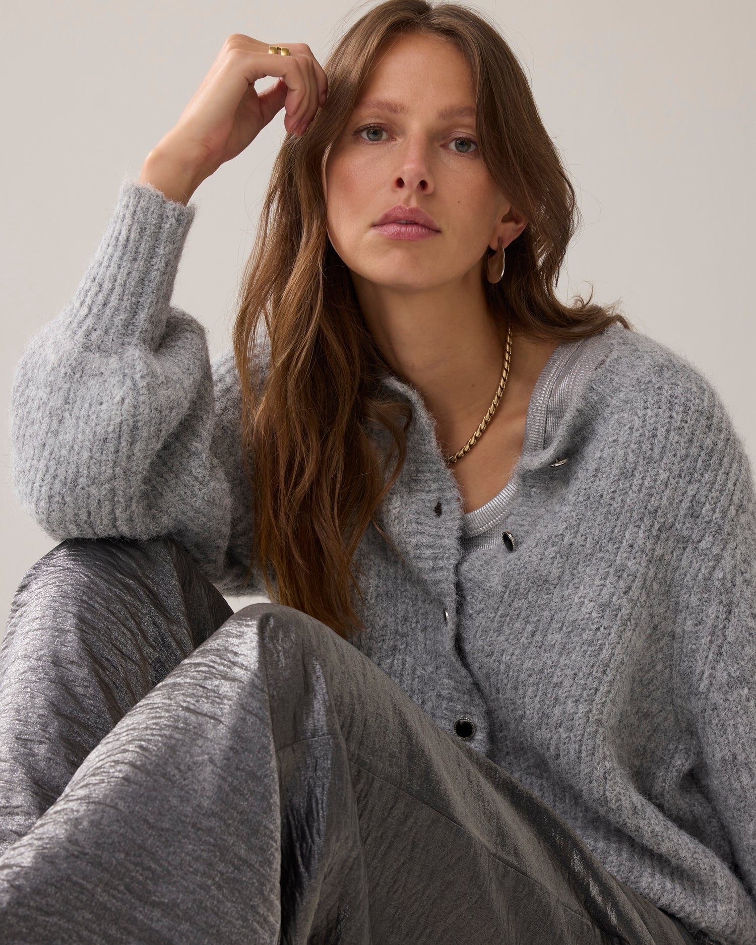 Knitted cardigan with large puff sleeves