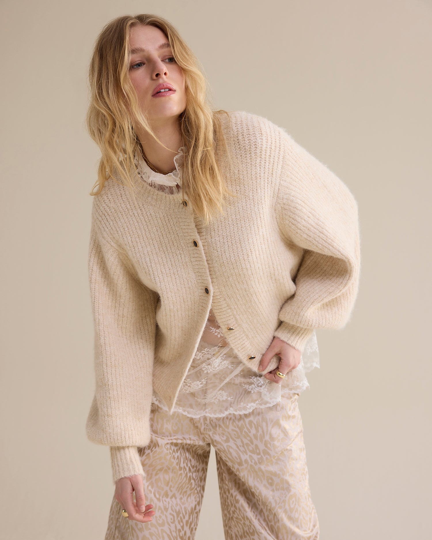 Knitted cardigan with large puff sleeves