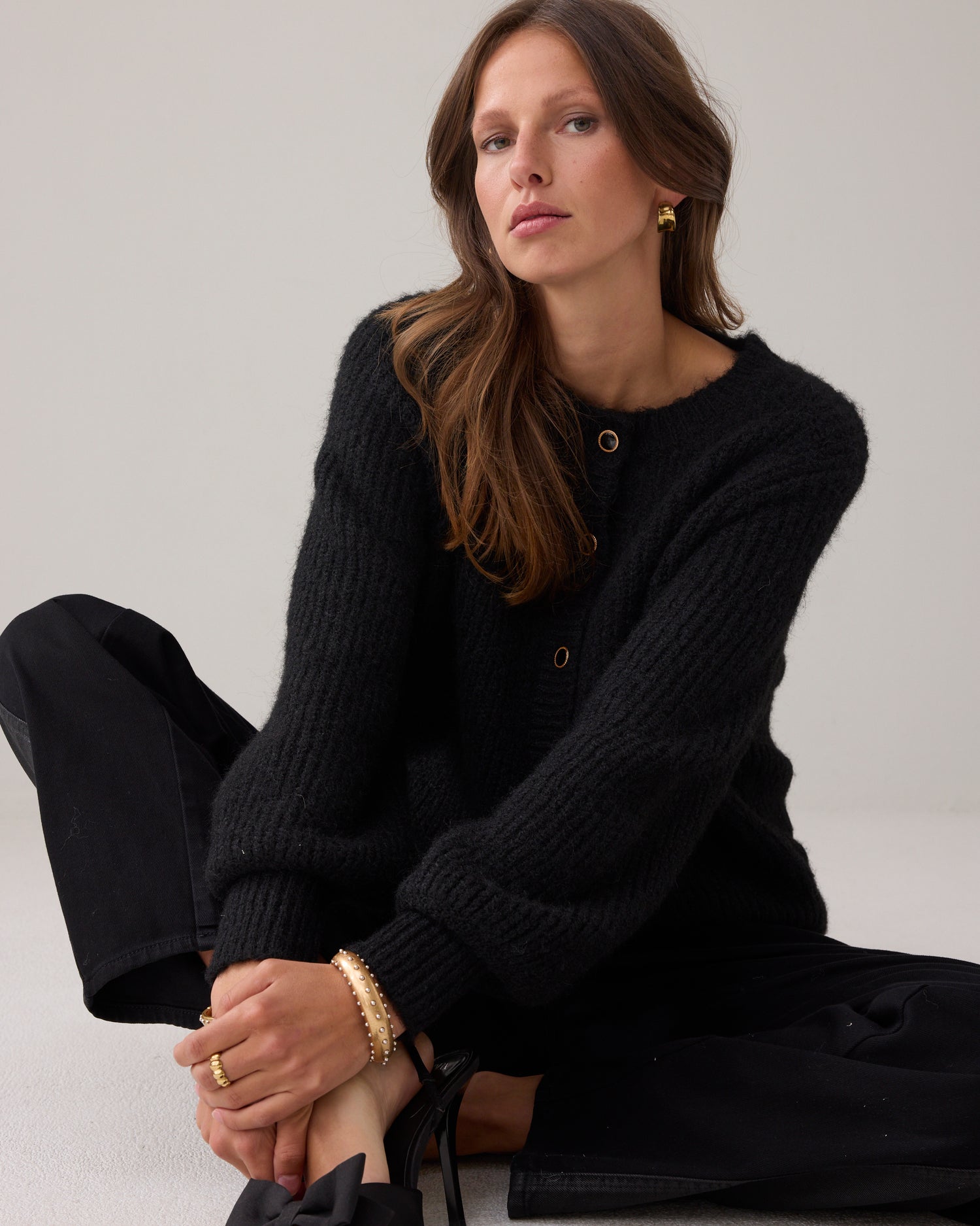 Knitted cardigan with large puff sleeves