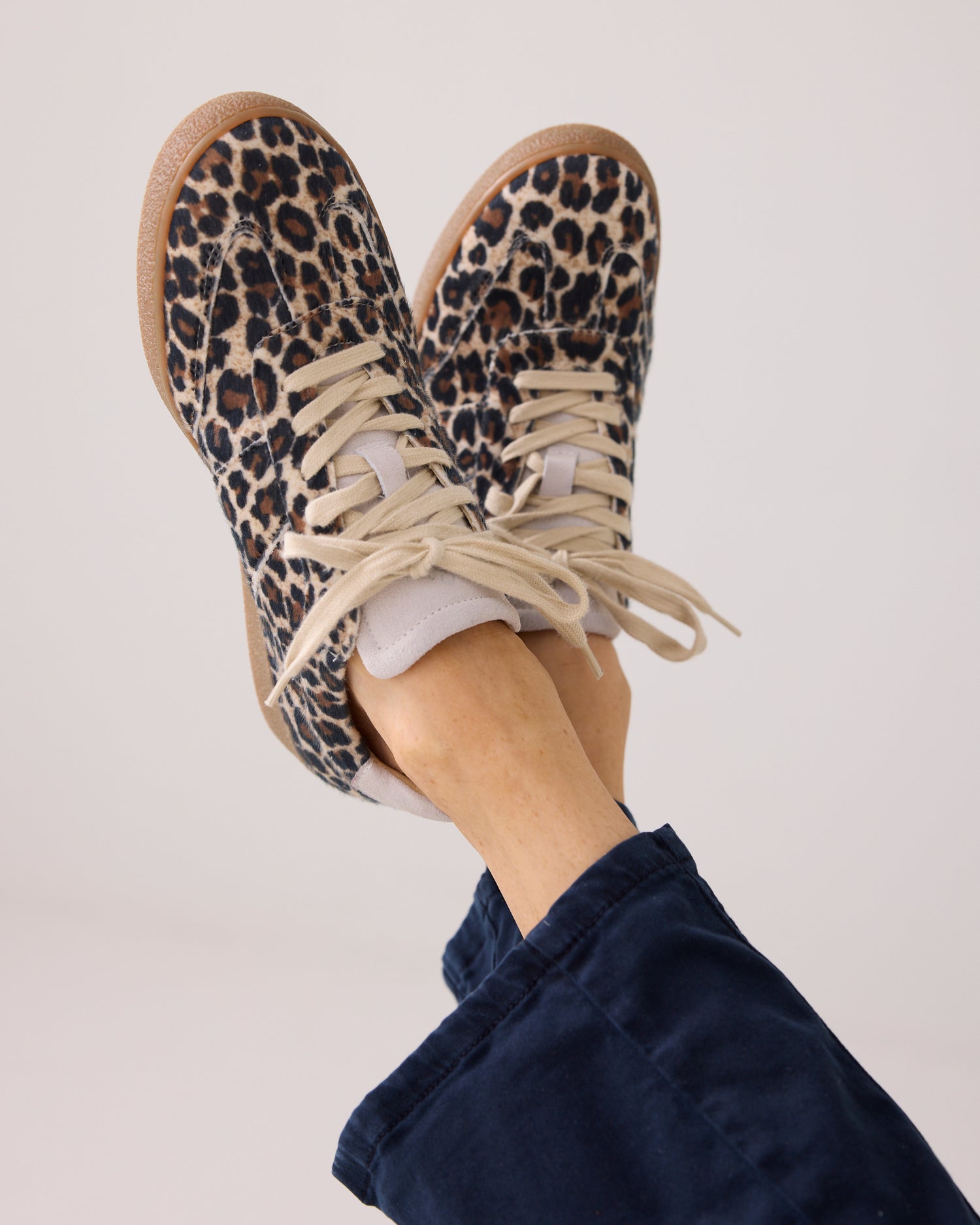 These trainers feature a synthetic upper with hairy animal print. The trainers have a rubber sole and leather lining.