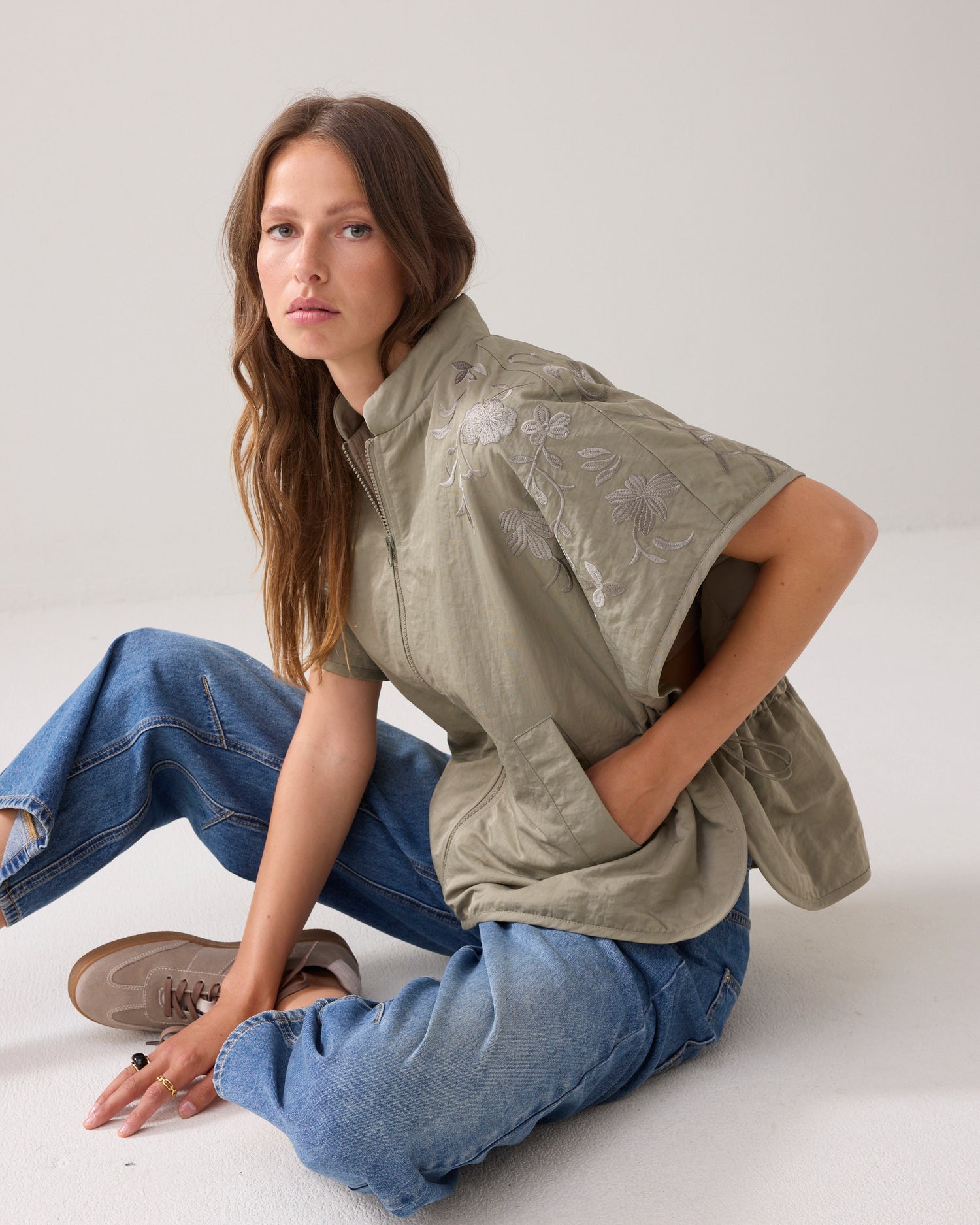 Embroidered gilet with embroidery